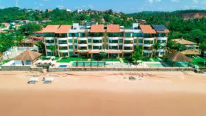 an aerial view of a resort on the beach at Waterfront Apart Hotel in Maceió