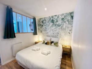 Postel nebo postele na pokoji v ubytování The Green House - Centre - Neuf & confort