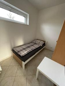 Postel nebo postele na pokoji v ubytování Ubytování Pardubice Trnová