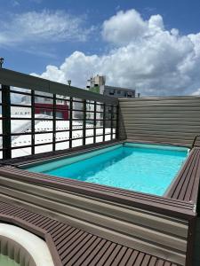 a swimming pool on top of a building at Hotel Classic VIP in San Andrés