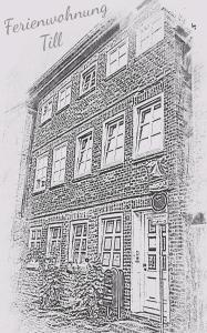 un dibujo en blanco y negro de un edificio de ladrillo en Ferienwohnung Till, en Mölln