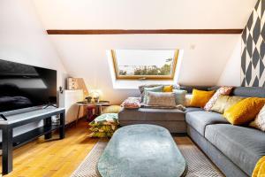 Istumisnurk majutusasutuses Art & Curiosity Cabinet Style Appartement with Paris view, Villa des Ammonites
