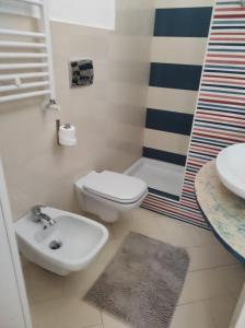 Koupelna v ubytování KiMia Home, Centro