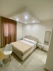 Voodi või voodid majutusasutuse Dorant Charme&Rooms toas