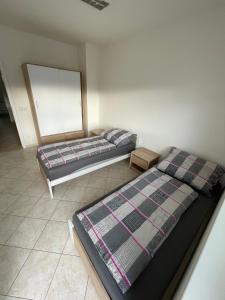 Postel nebo postele na pokoji v ubytování Ubytování Pardubice Trnová