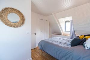 Letto o letti in una camera di Paradis côtier - Maison vue mer à Loguivy
