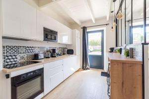 Cucina o angolo cottura di Paradis côtier - Maison vue mer à Loguivy
