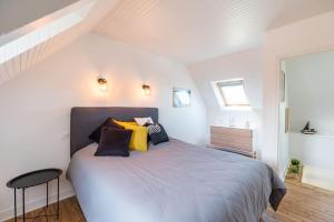 Letto o letti in una camera di Paradis côtier - Maison vue mer à Loguivy