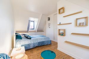 Letto o letti in una camera di Paradis côtier - Maison vue mer à Loguivy