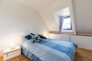 Letto o letti in una camera di Paradis côtier - Maison vue mer à Loguivy