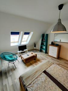 a living room with a coffee table and a couch at RYB Lofts Budapest in Budapest