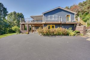 una casa con una gran entrada delante de ella en Charming Claverack Retreat with Serene Deck! en Claverack