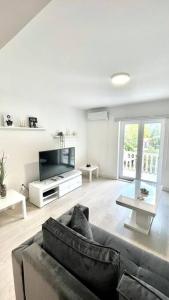 Μια τηλεόραση ή/και κέντρο ψυχαγωγίας στο Apartman DolceRosa