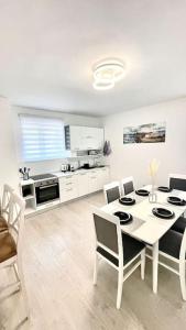 Η κουζίνα ή μικρή κουζίνα στο Apartman DolceRosa