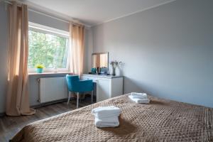 Łóżko lub łóżka w pokoju w obiekcie Willa Sonata - Apartamenty & Balia - Szklarska Poręba