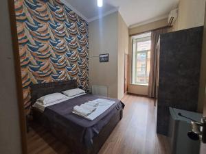 Кровать или кровати в номере Hotel Eldorado
