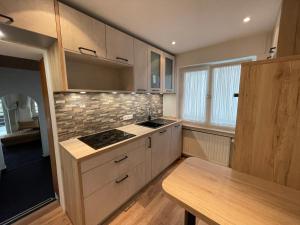 Køkken eller tekøkken på Ferienwohnungen Haus zur Linde + 13 billeder