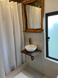 Koupelna v ubytování La Arboleda, Refugio + 5 fotografií