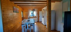 a room with a table in the middle of a room at Casa Magnolia in Bran