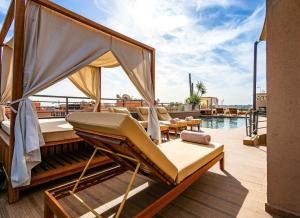 a deck with a massage bed on a boat at Fashion Boutique Hotel in Marrakesh