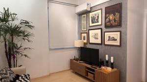 Een TV en/of entertainmentcenter bij Praia de Ipanema
