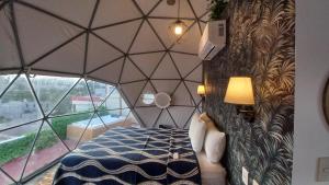Postel nebo postele na pokoji v ubytování Hotel Peña Florencia