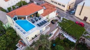 an overhead view of a house with a swimming pool at Apartments Sweet Dreams in Trebinje