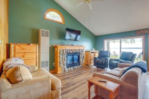 A seating area at Kalkaska Retreat Private Hot Tub, Dock, Fireplace