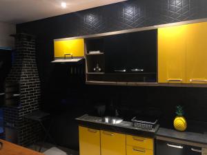 A kitchen or kitchenette at Casa Belmond