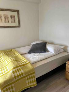 Postel nebo postele na pokoji v ubytování Cozy Apartment with a Veranda