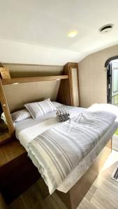 a bedroom with a bed in a room at 63 Acre Farmstay - A luxury farm experience in San Mateo