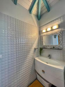 Ein Badezimmer in der Unterkunft Gites Fleurs d'abeilles