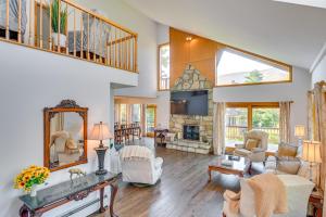 a living room filled with furniture and a fireplace at New York Retreat - Furnished Deck and Mountain Views in Lanesville