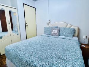 Säng eller sängar i ett rum på Ree Guesthouse
