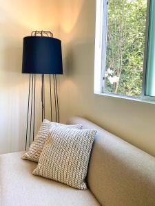 Ένα ή περισσότερα κρεβάτια σε δωμάτιο στο Hollywood Guesthouse