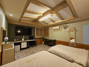 Postel nebo postele na pokoji v ubytování Hotel G7 Daejeon