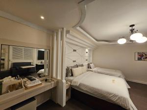 Postel nebo postele na pokoji v ubytování Hotel G7 Daejeon