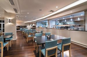Restoranas ar kita vieta pavalgyti apgyvendinimo įstaigoje Hilton Garden Inn Darwin