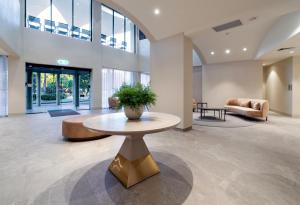 Svetainės erdvė apgyvendinimo įstaigoje Hilton Garden Inn Darwin