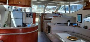 an interior of an rv with a kitchen and a refrigerator at GYPSIES DRIFTER in Vancouver