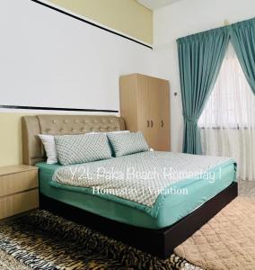 a bedroom with a bed with a headboard and a window at Traveler homestay paka 3-6pax in front Surau and near Paka Beach - Y2L Homestay 1 in Paka