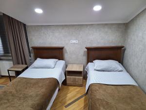 Postel nebo postele na pokoji v ubytování GUEST HOUSE 15A