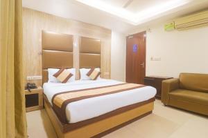 Postel nebo postele na pokoji v ubytování Hotel Sizzling Starr