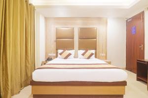 Postel nebo postele na pokoji v ubytování Hotel Sizzling Starr