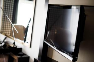 TV a/nebo společenská místnost v ubytování Kyoto Brighton Hotel