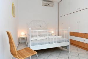 Posteľ alebo postele v izbe v ubytovaní Beachfront-Santa Marina Vacation Home
