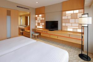 TV a/nebo společenská místnost v ubytování Kyoto Brighton Hotel