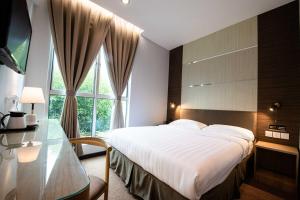 Postel nebo postele na pokoji v ubytování Hotel Meliden