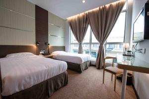 Postel nebo postele na pokoji v ubytování Hotel Meliden