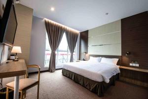 Postel nebo postele na pokoji v ubytování Hotel Meliden